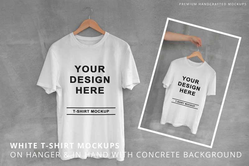 White T-Shirt on Hanger with Concrete Background B6DDBLV